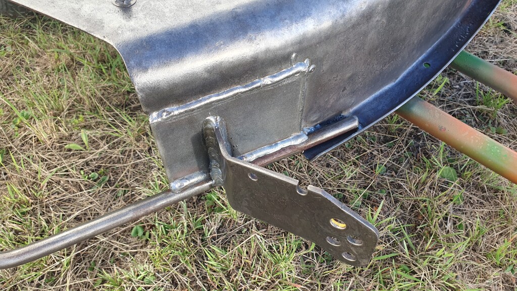 scalp wheel bracket reattached to cutting deck with thicker steel