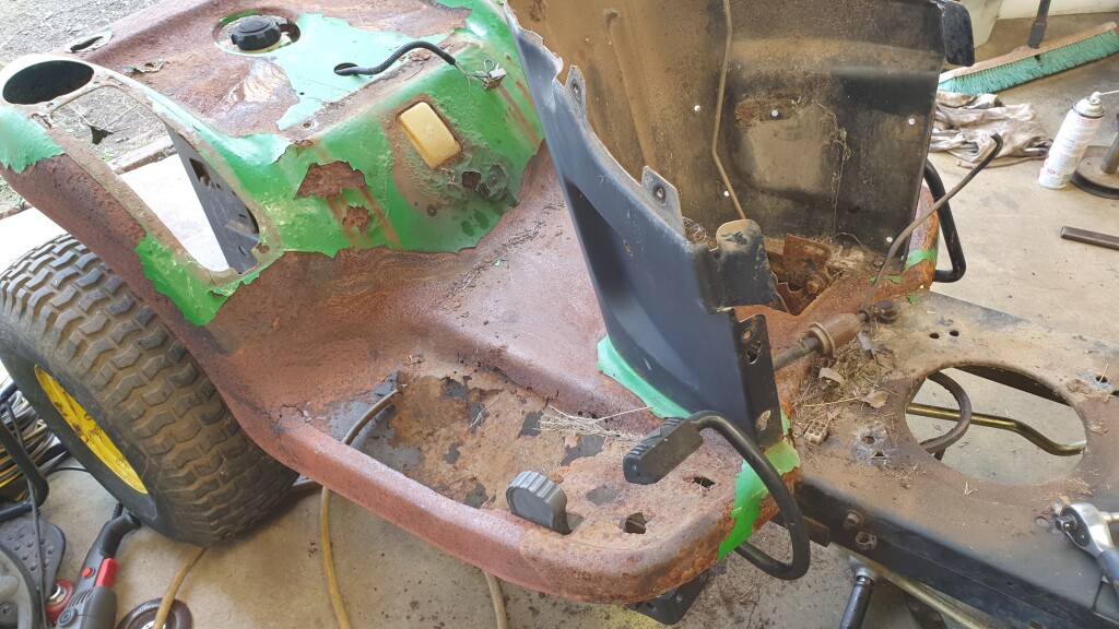 rusted and worn out ride on mower