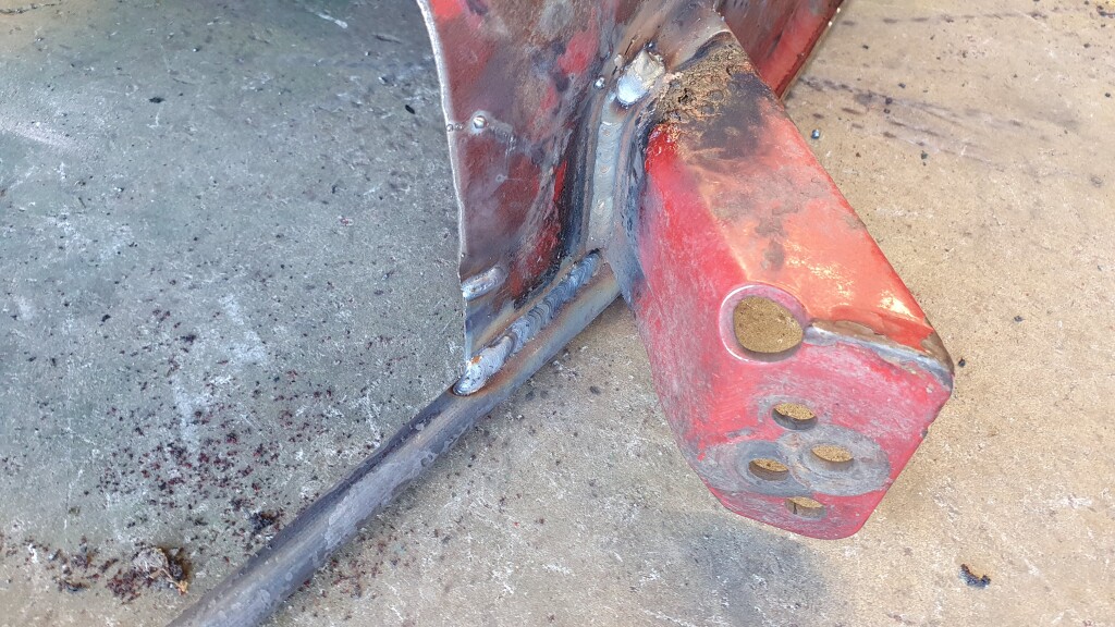 mower deck bracket with welding repair