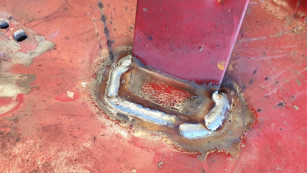 mower deck bracket with welding repair